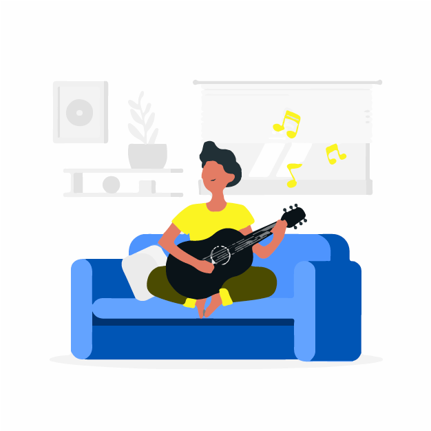 A man playing his guitar on a couch